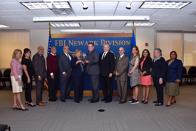 FBINewarkCAAA was presented with the Presidential Chapter of Excellence Award by FBI Newark SAC George M. Crouch Jr.